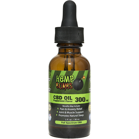 Hemp bombs CBD oil bottle in a pure white background