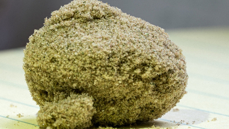 Close up image of a ball of kief on the table