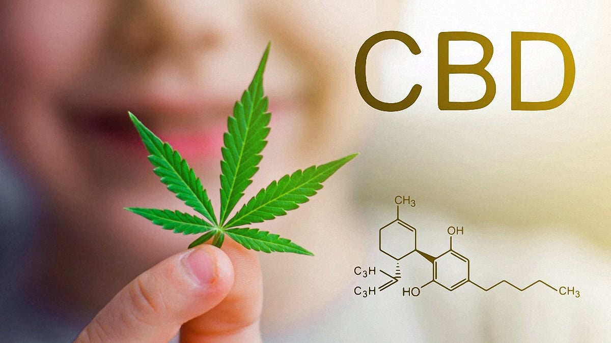 A kid holding a hemp leaf with cbd chemistry icon in a gold background