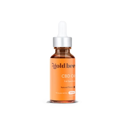 Gold Bee CBD oil in white background