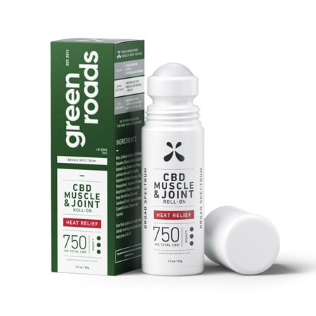 Green Roads CBD Muscle and Joint roll-on heat relief on white background