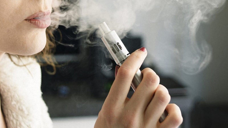 Woman Vaping CBD