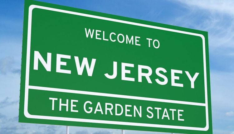 New Jersey State Sign on blue sky background