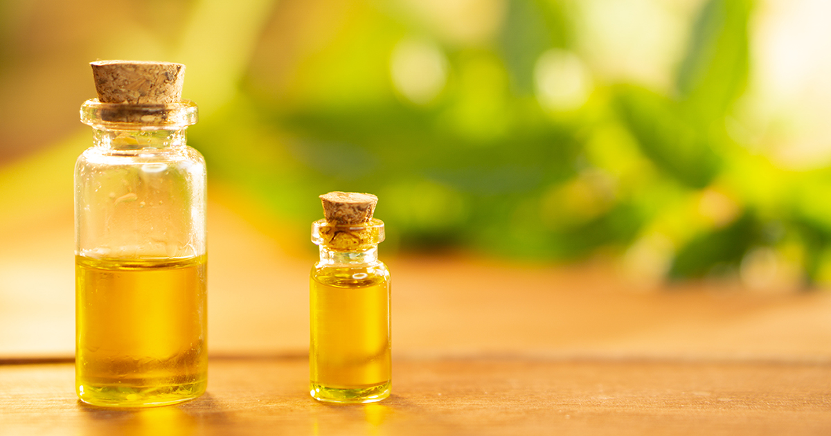 Hemp oil extract in bottles on a wooden table
